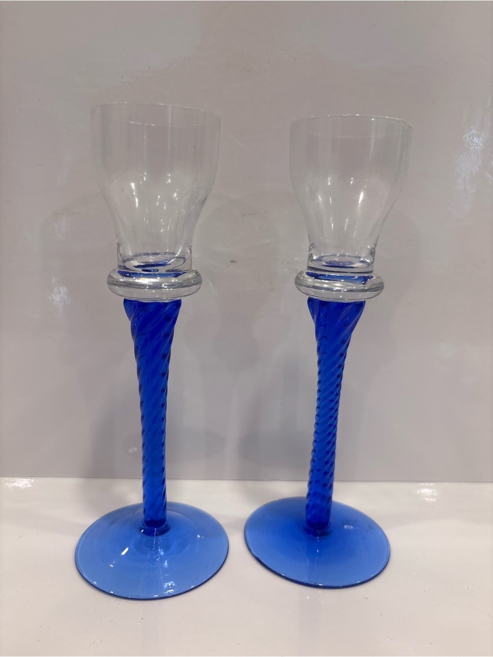Pair of hand blown cobalt blue twisted stem candle holders Murano style